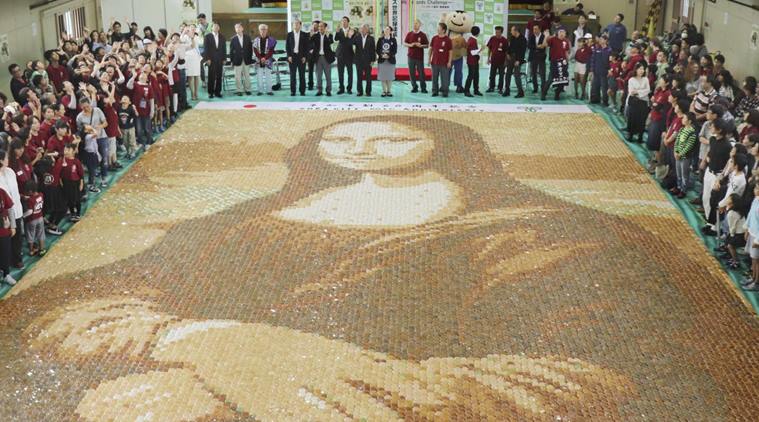 Japanese Town Creates A Gigantic Mona Lisa Painting Using Rice Crackers, Achieves Guinness World Record