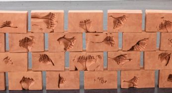 Danish Artist Creates Sculpture Of Hand Impressions On Clay As Memorial For His Departed Father